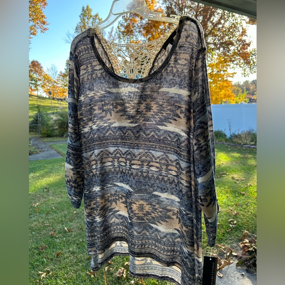 NWT women’s top. The lace goes in the back and is Boho style. Lightweight.